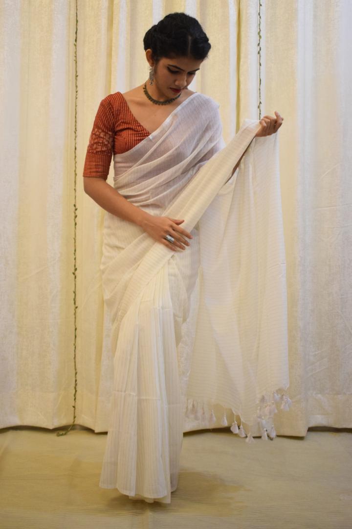 Saraswati: Pearl White Mulmul-Zari Stripes Saree