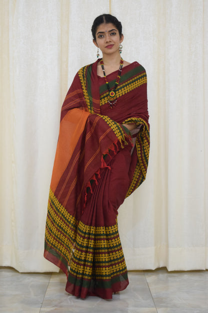 Jinisha: Maroon & Green Begumpuri cotton saree