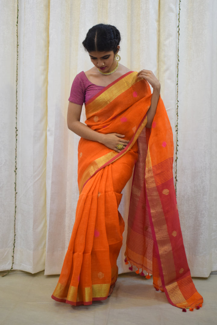 Agneya: Orange Linen Jamdani Saree