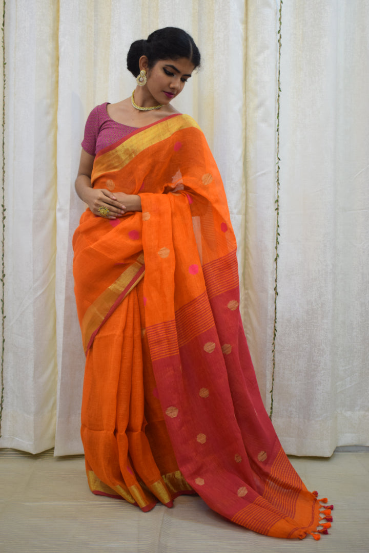 Agneya: Orange Linen Jamdani Saree