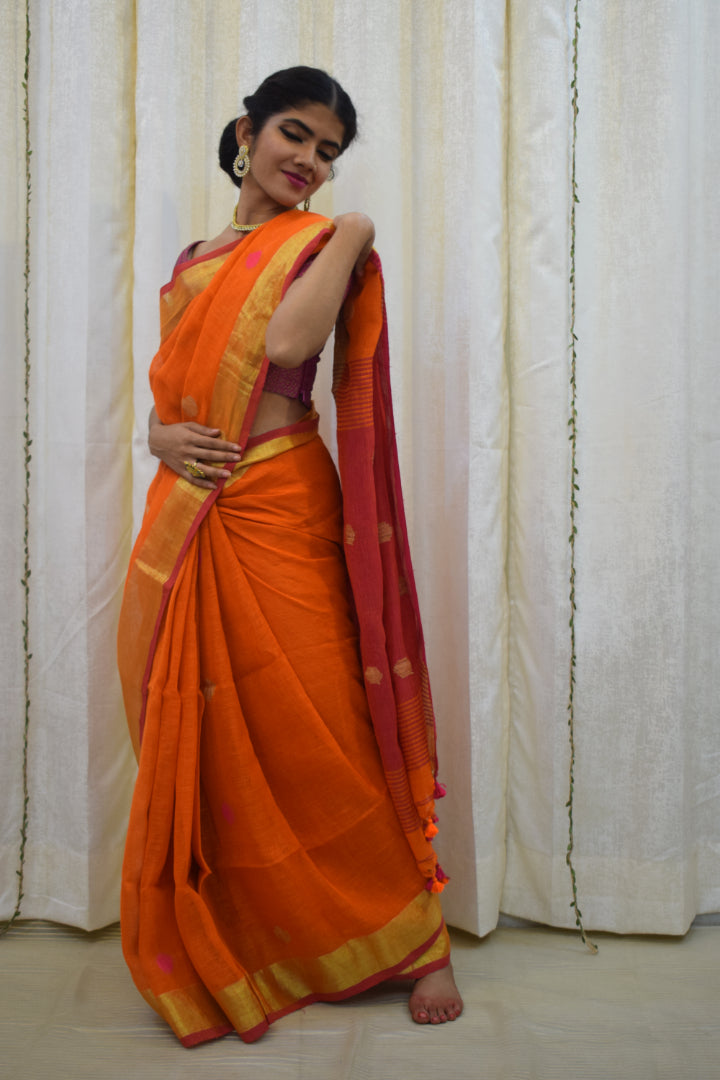 Agneya: Orange Linen Jamdani Saree