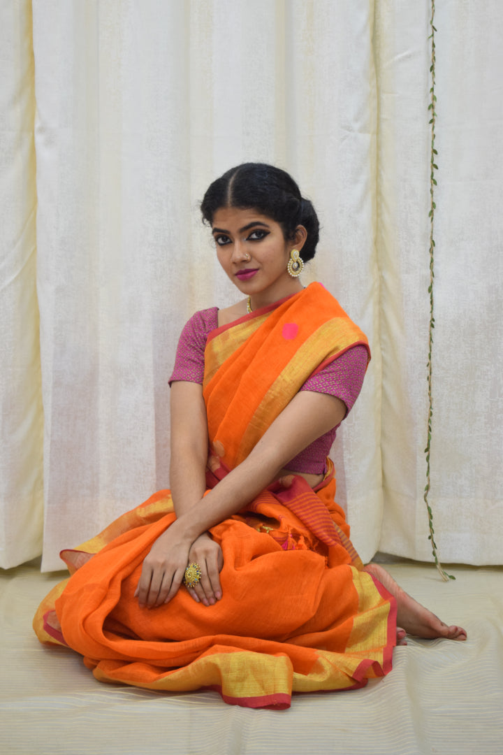 Agneya: Orange Linen Jamdani Saree