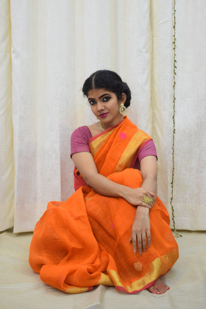 Agneya: Orange Linen Jamdani Saree