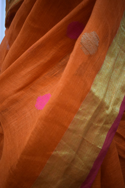 Agneya: Orange Linen Jamdani Saree