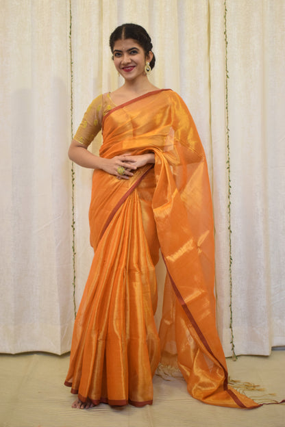 Drishana: Orange zari-Linen Tissue Saree