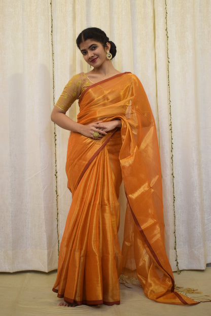 Drishana: Orange zari-Linen Tissue Saree