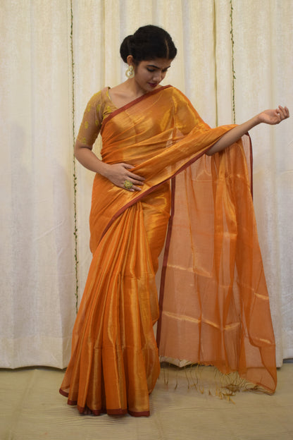 Drishana: Orange zari-Linen Tissue Saree