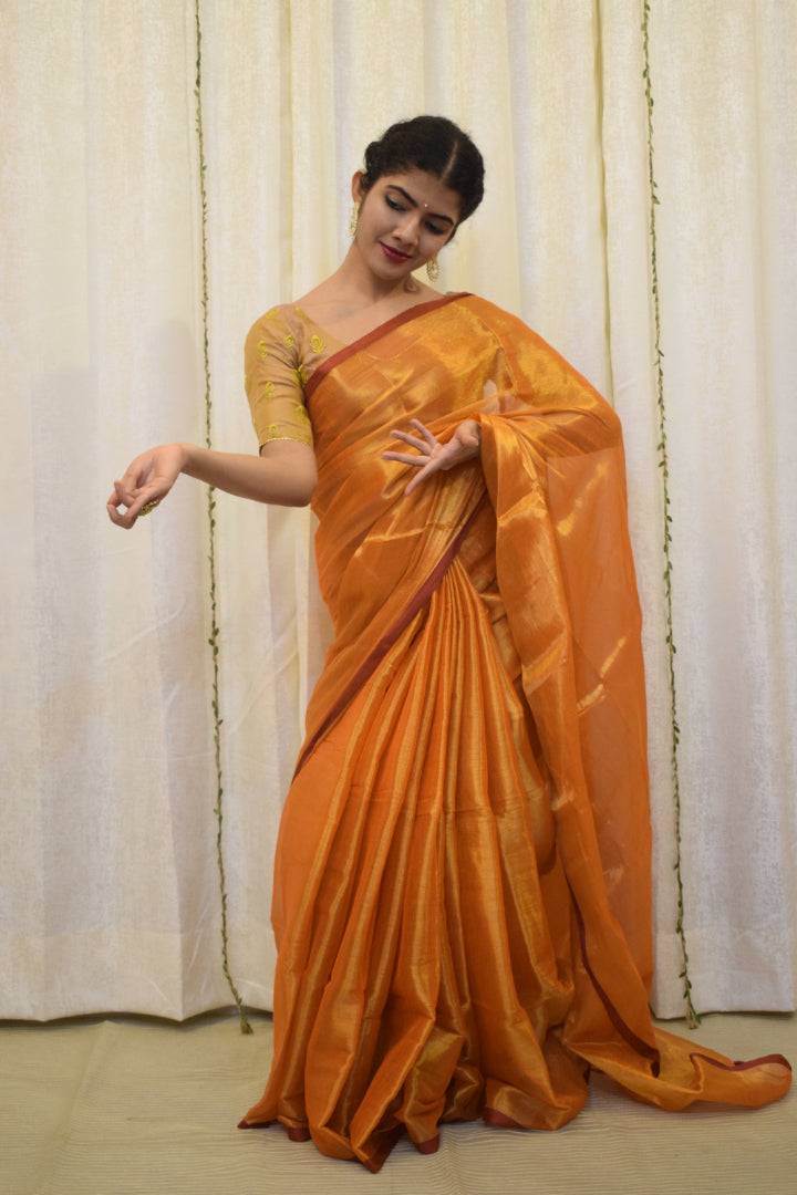 Drishana: Orange zari-Linen Tissue Saree