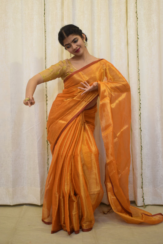 Drishana: Orange zari-Linen Tissue Saree