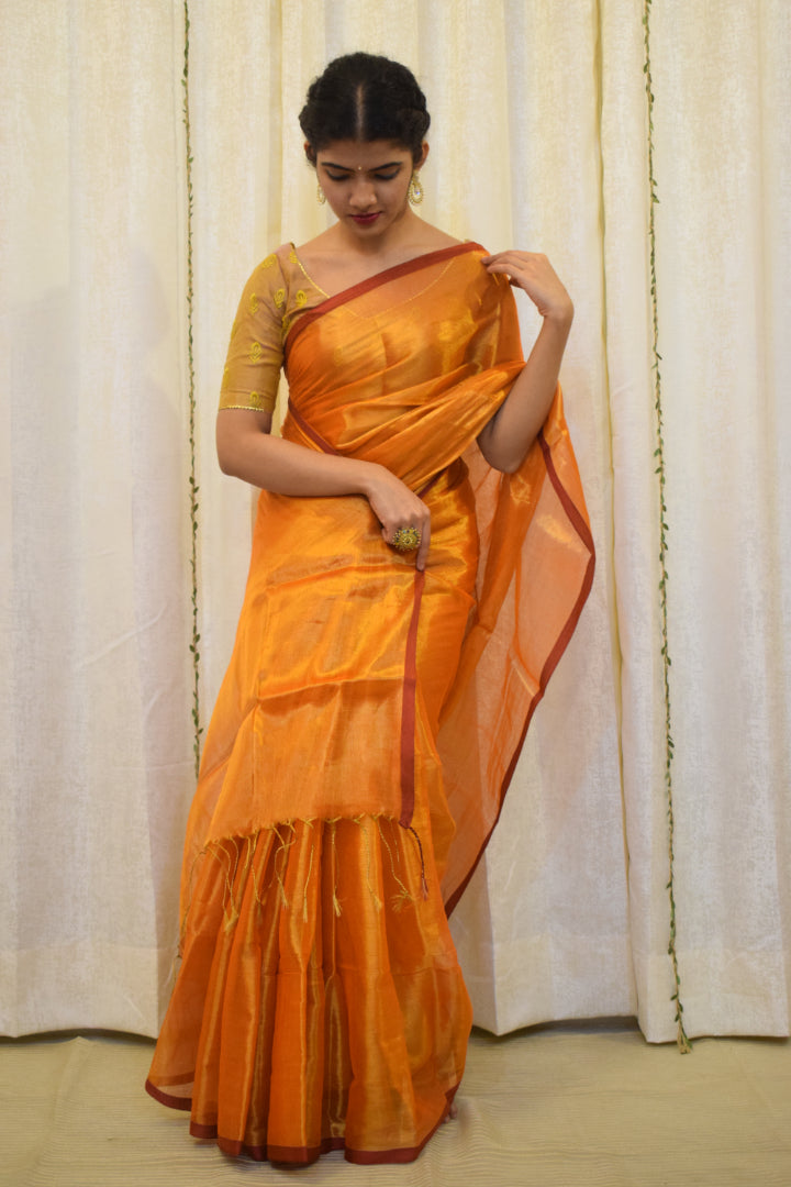 Drishana: Orange zari-Linen Tissue Saree