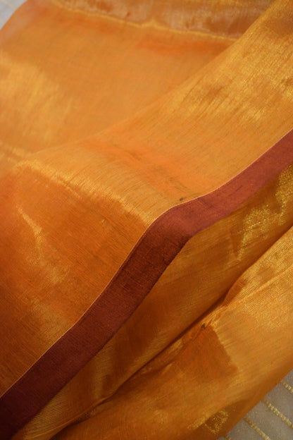 Drishana: Orange zari-Linen Tissue Saree