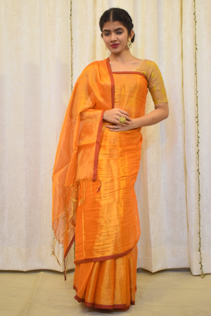 Drishana: Orange zari-Linen Tissue Saree