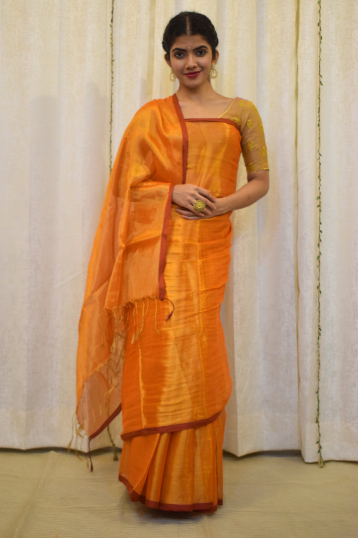 Drishana: Orange zari-Linen Tissue Saree