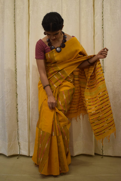 Malini: Amber yellow khadi cotton saree