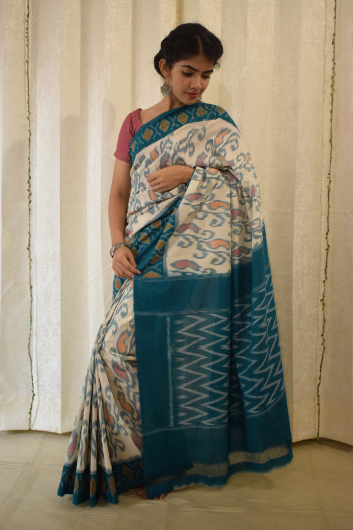 Vasundharā- White & Green Cotton Pochampally Ikat Saree