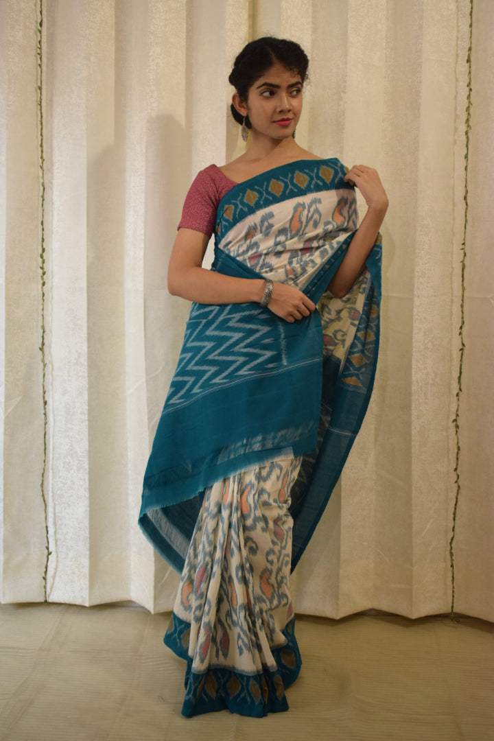 Vasundharā- White & Green Cotton Pochampally Ikat Saree