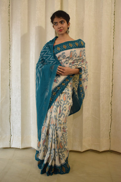 Vasundharā- White & Green Cotton Pochampally Ikat Saree