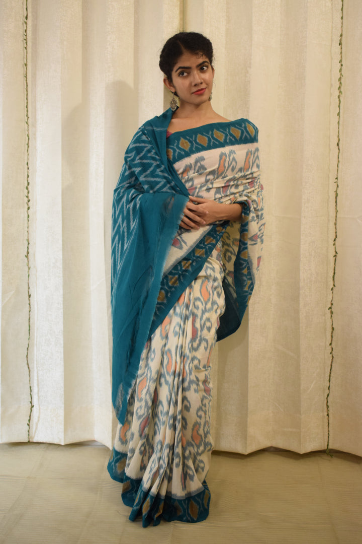 Vasundharā- White & Green Cotton Pochampally Ikat Saree