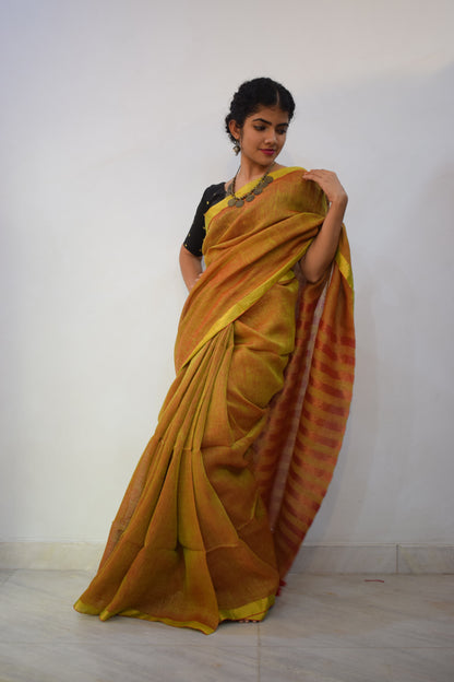 Swarnābhā- Golden Brown Linen Zari Saree