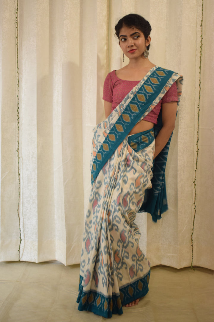 Vasundharā- White & Green Cotton Pochampally Ikat Saree