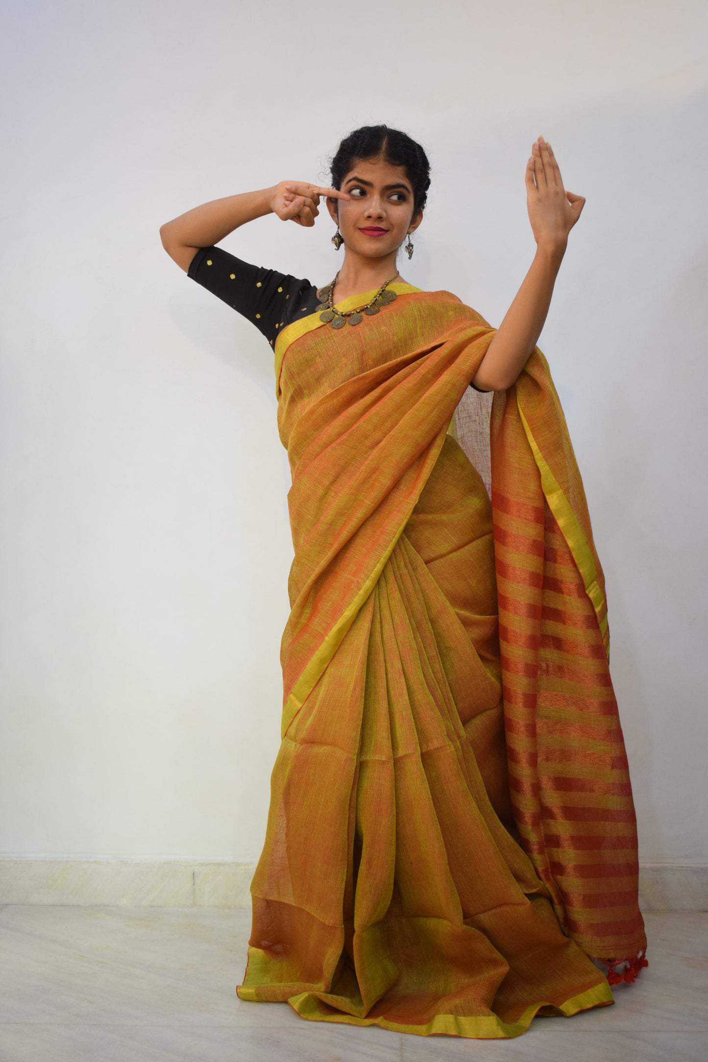 Swarnābhā- Golden Brown Linen Zari Saree