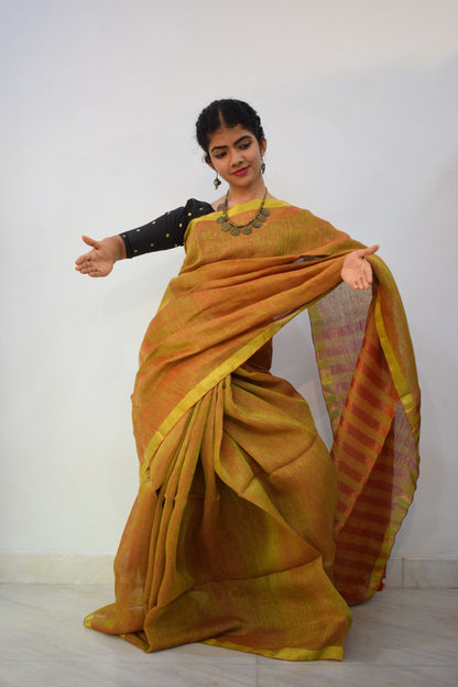 Swarnābhā- Golden Brown Linen Zari Saree