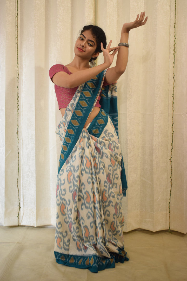 Vasundharā- White & Green Cotton Pochampally Ikat Saree