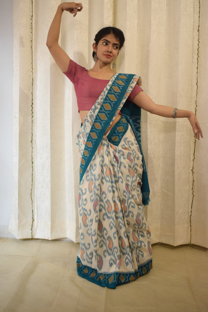 Vasundharā- White & Green Cotton Pochampally Ikat Saree