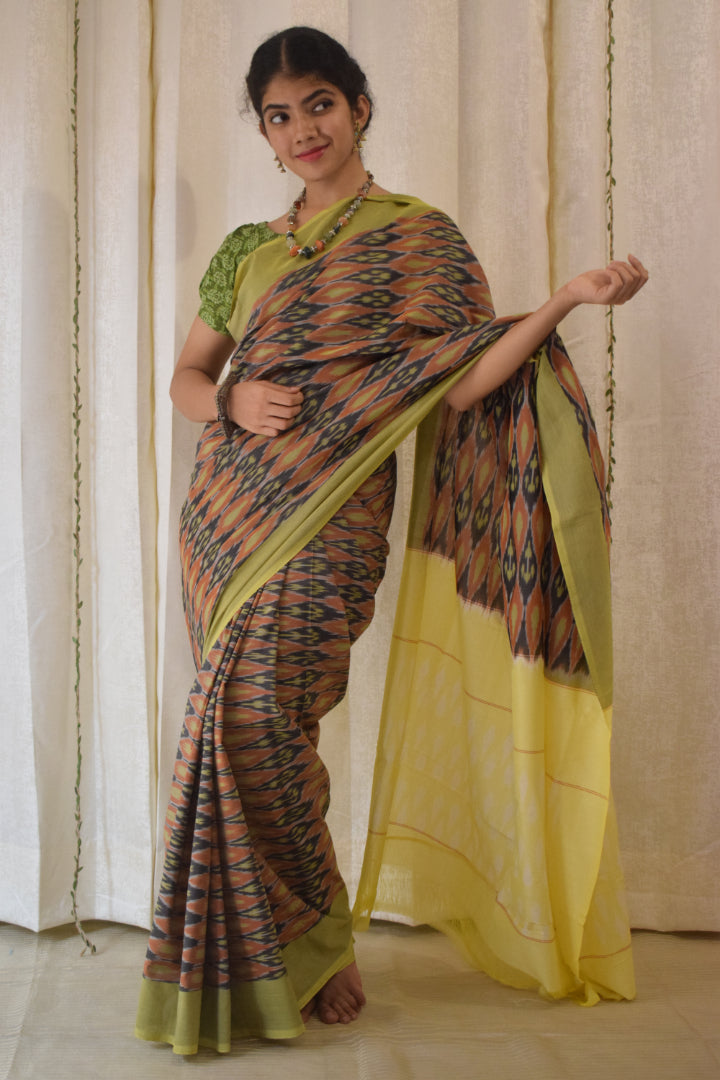 Urvija: Terracota & Yellow Cotton Pochampally Ikat Saree