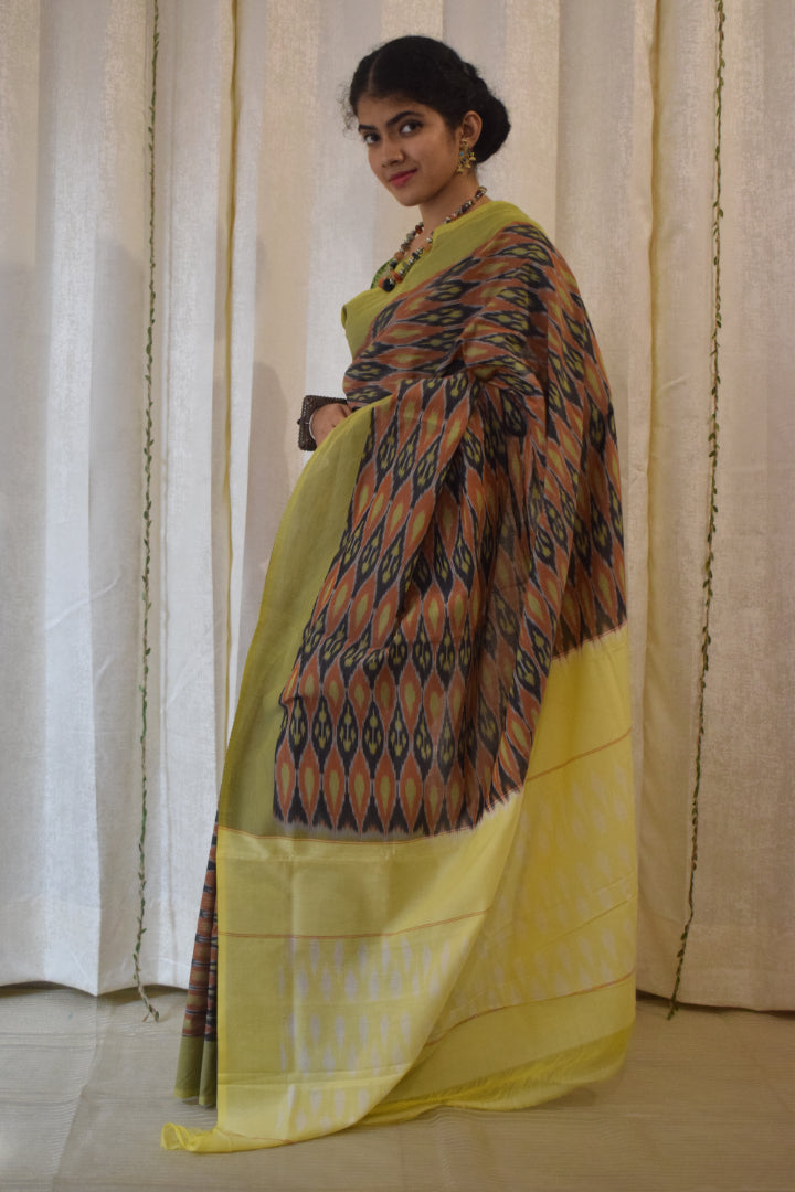 Urvija: Terracota & Yellow Cotton Pochampally Ikat Saree