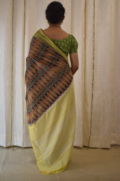 Urvija: Terracota & Yellow Cotton Pochampally Ikat Saree