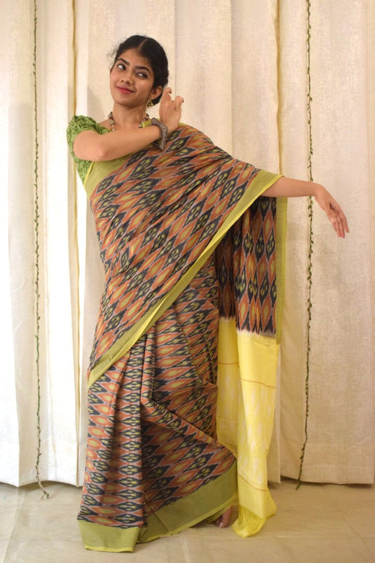 Urvija: Terracota & Yellow Cotton Pochampally Ikat Saree