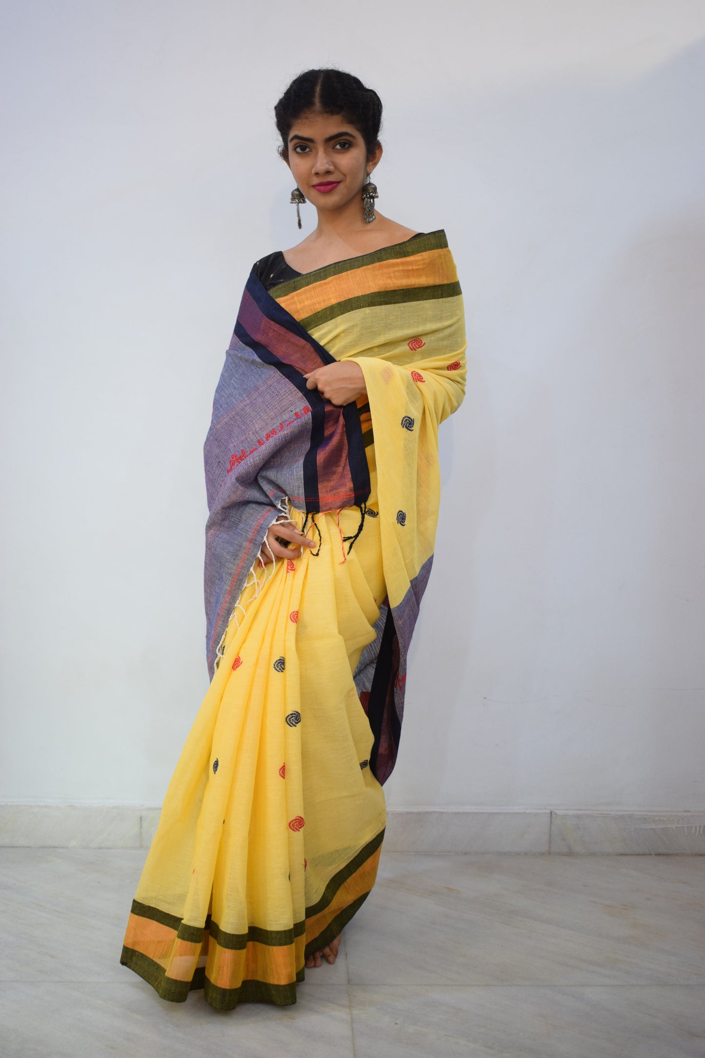 Tānisi- Yellow Khadi Cotton Jamdani Saree