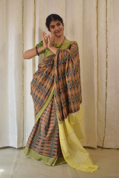 Urvija: Terracota & Yellow Cotton Pochampally Ikat Saree