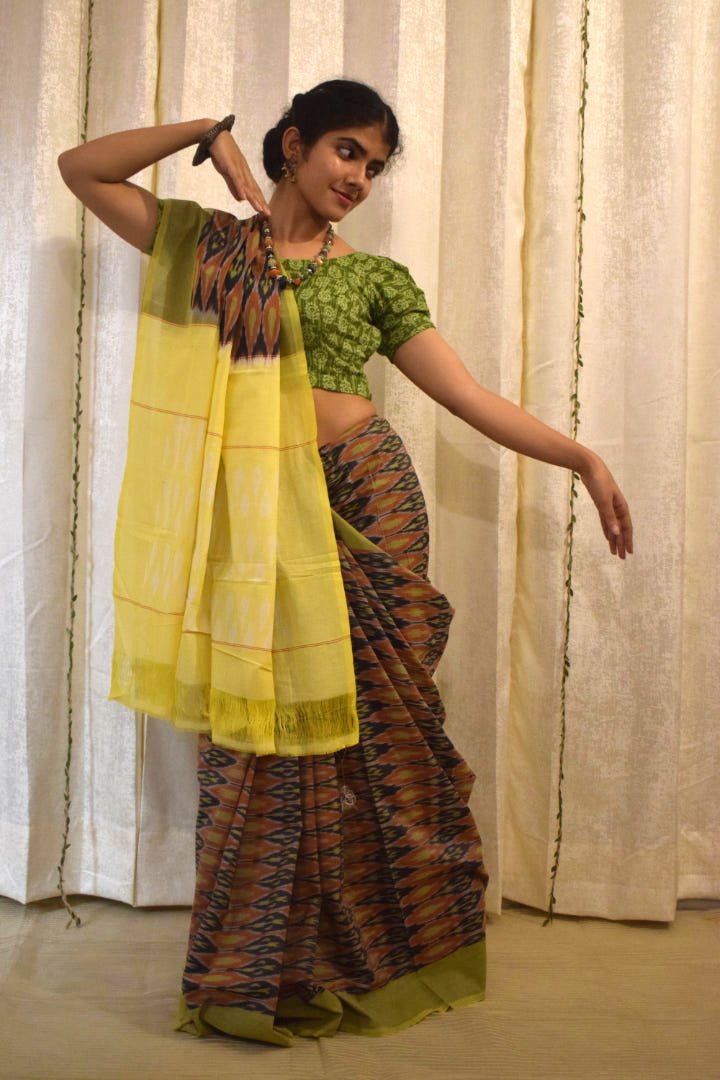 Urvija: Terracota & Yellow Cotton Pochampally Ikat Saree