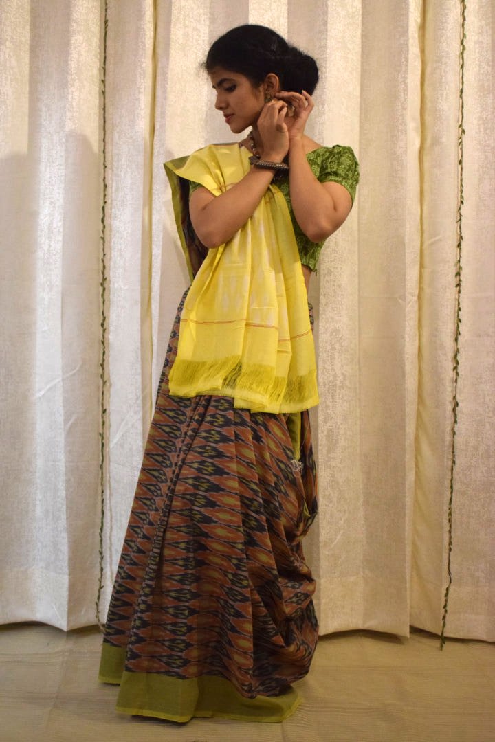 Urvija: Terracota & Yellow Cotton Pochampally Ikat Saree