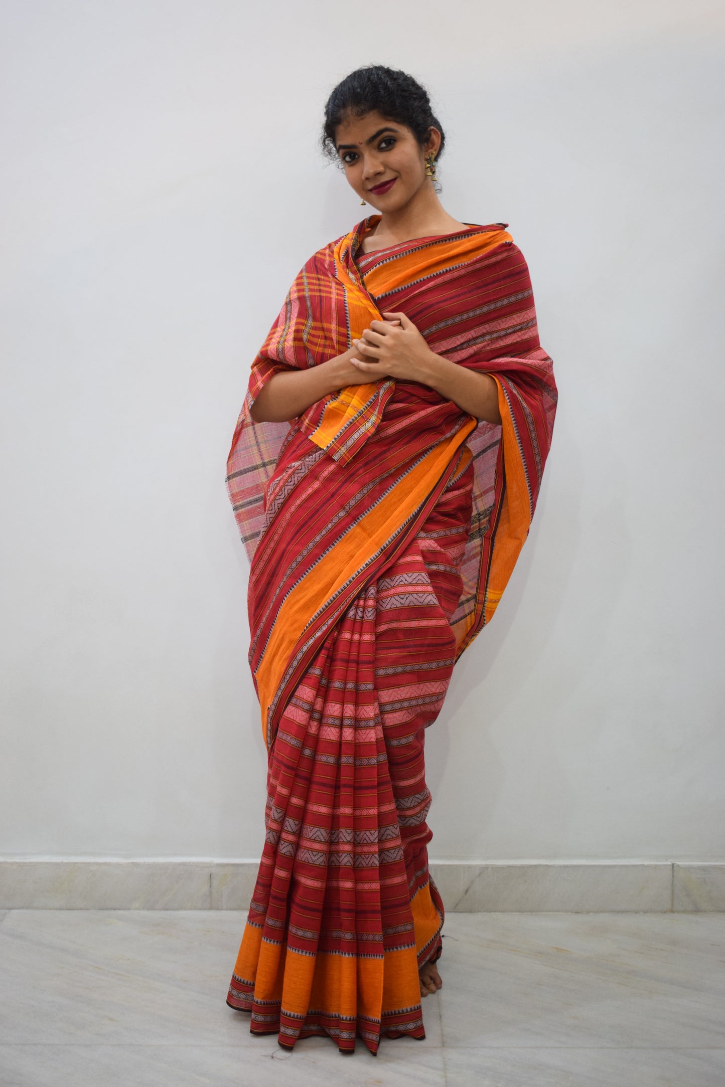 Dhananyā- Red & Yellow Dhaniakhali Cotton Saree