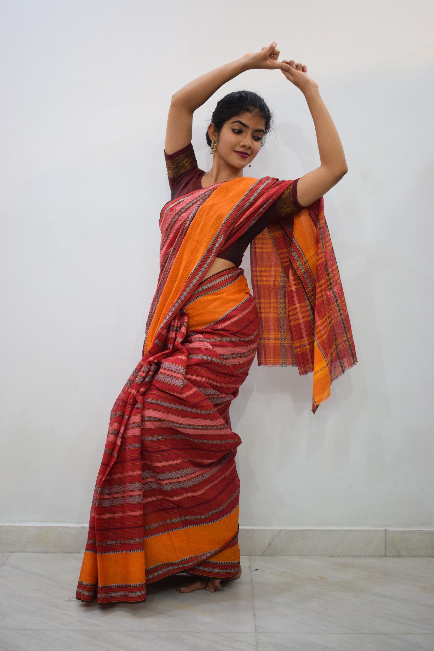 Dhananyā- Red & Yellow Dhaniakhali Cotton Saree