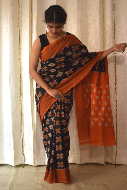 Yamini: Black & Orange Cotton Pochampalli Ikat Saree