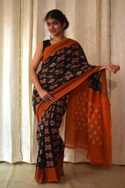 Yamini: Black & Orange Cotton Pochampalli Ikat Saree