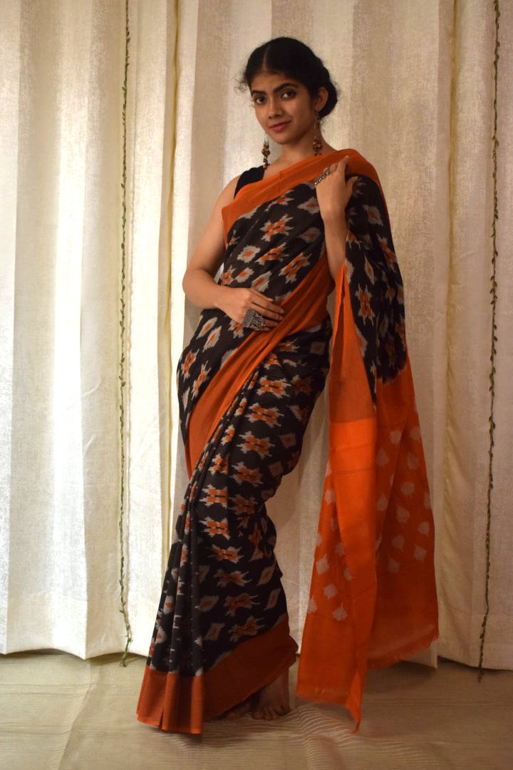 Yamini: Black & Orange Cotton Pochampalli Ikat Saree