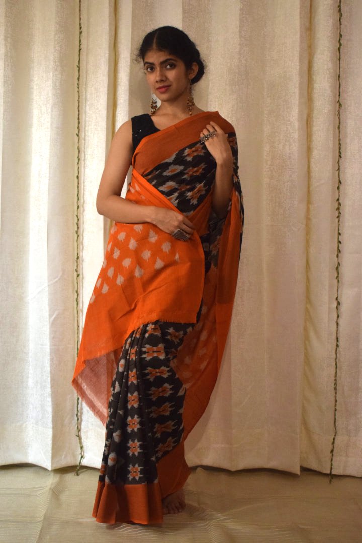 Yamini: Black & Orange Cotton Pochampalli Ikat Saree