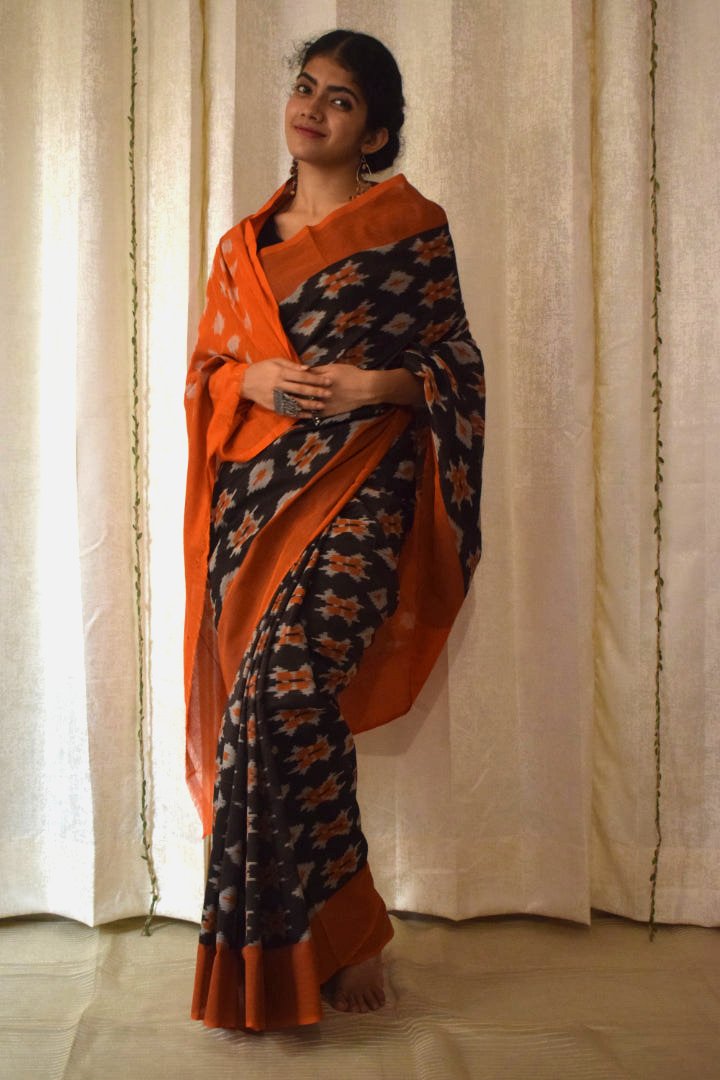 Yamini: Black & Orange Cotton Pochampalli Ikat Saree