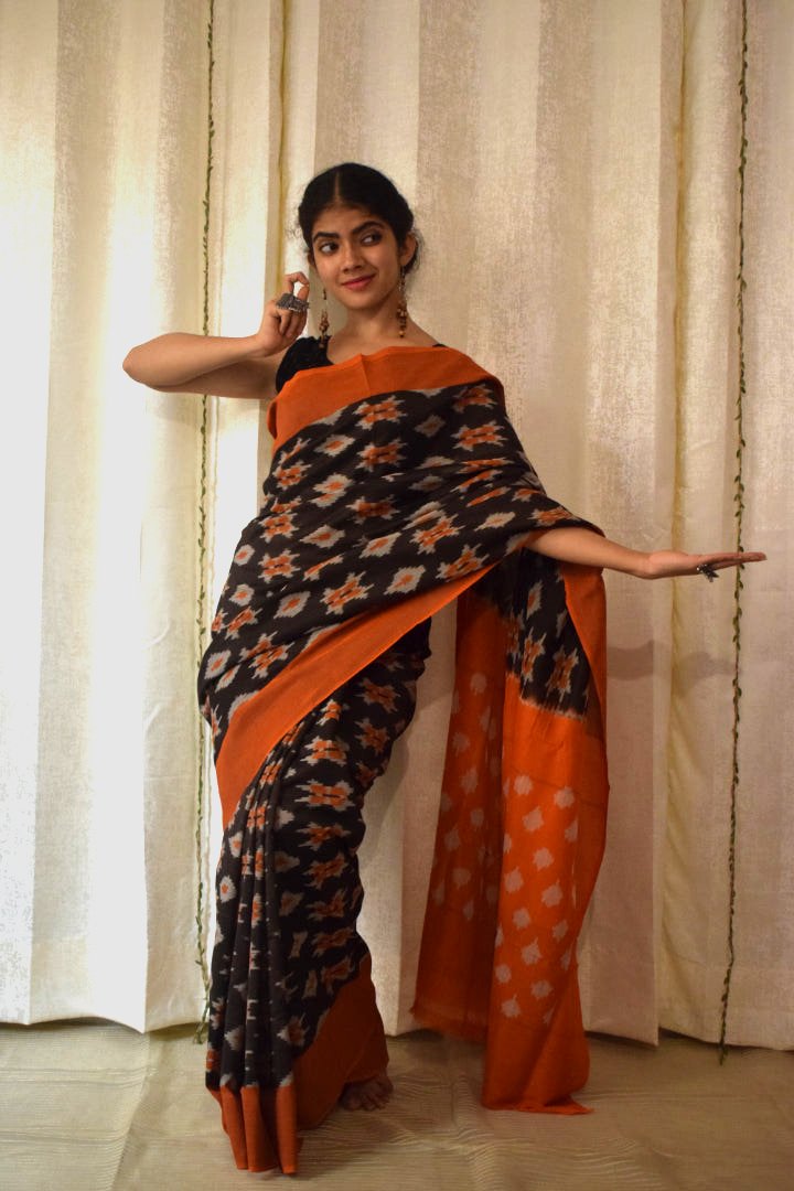 Yamini: Black & Orange Cotton Pochampalli Ikat Saree