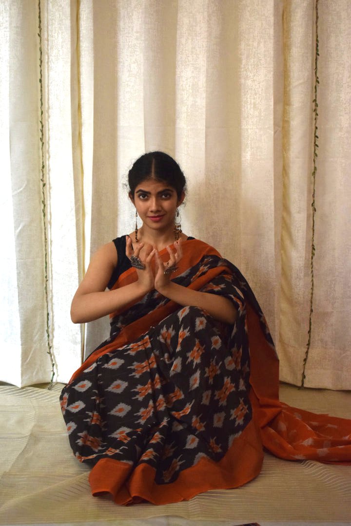 Yamini: Black & Orange Cotton Pochampalli Ikat Saree