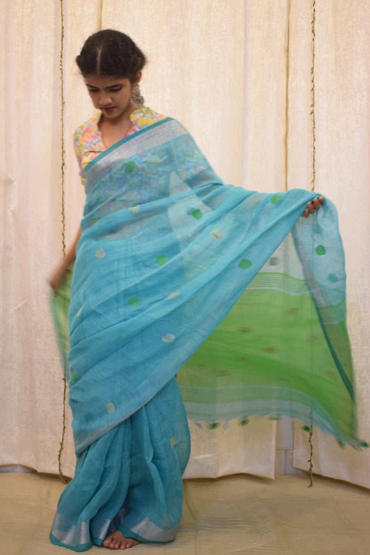 Urmi: Cyan Blue Linen Jamdani Saree