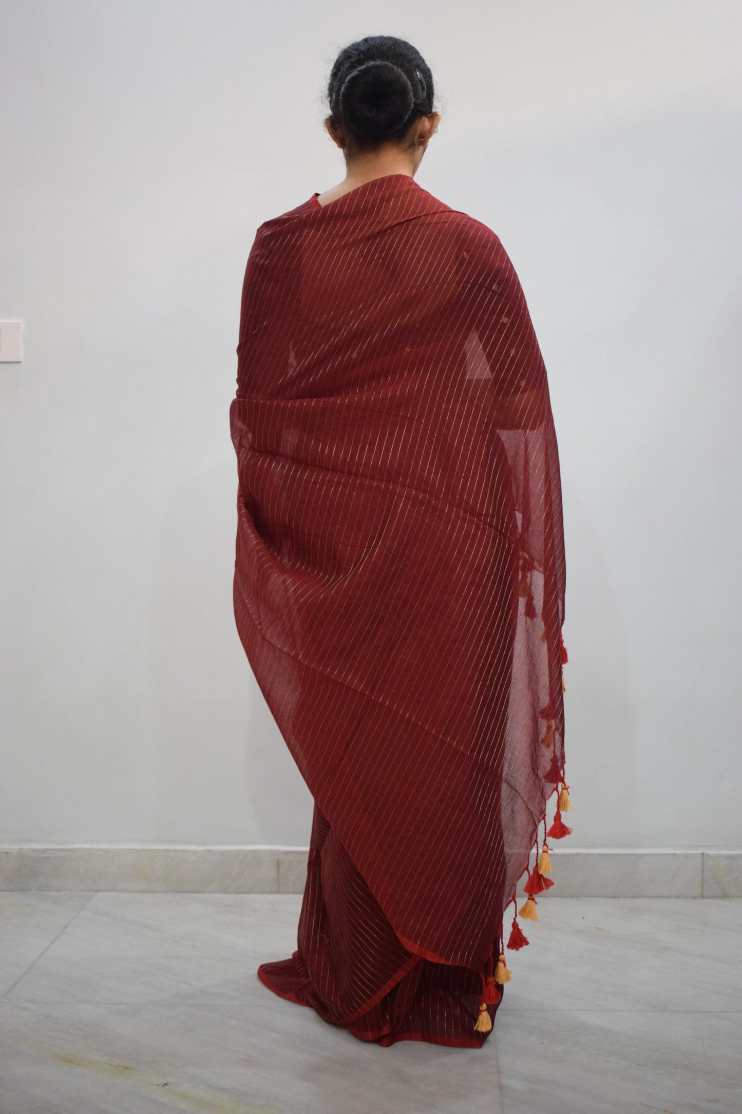 Nakshatra- Deep Red Mulmul-Zari Stripes Saree