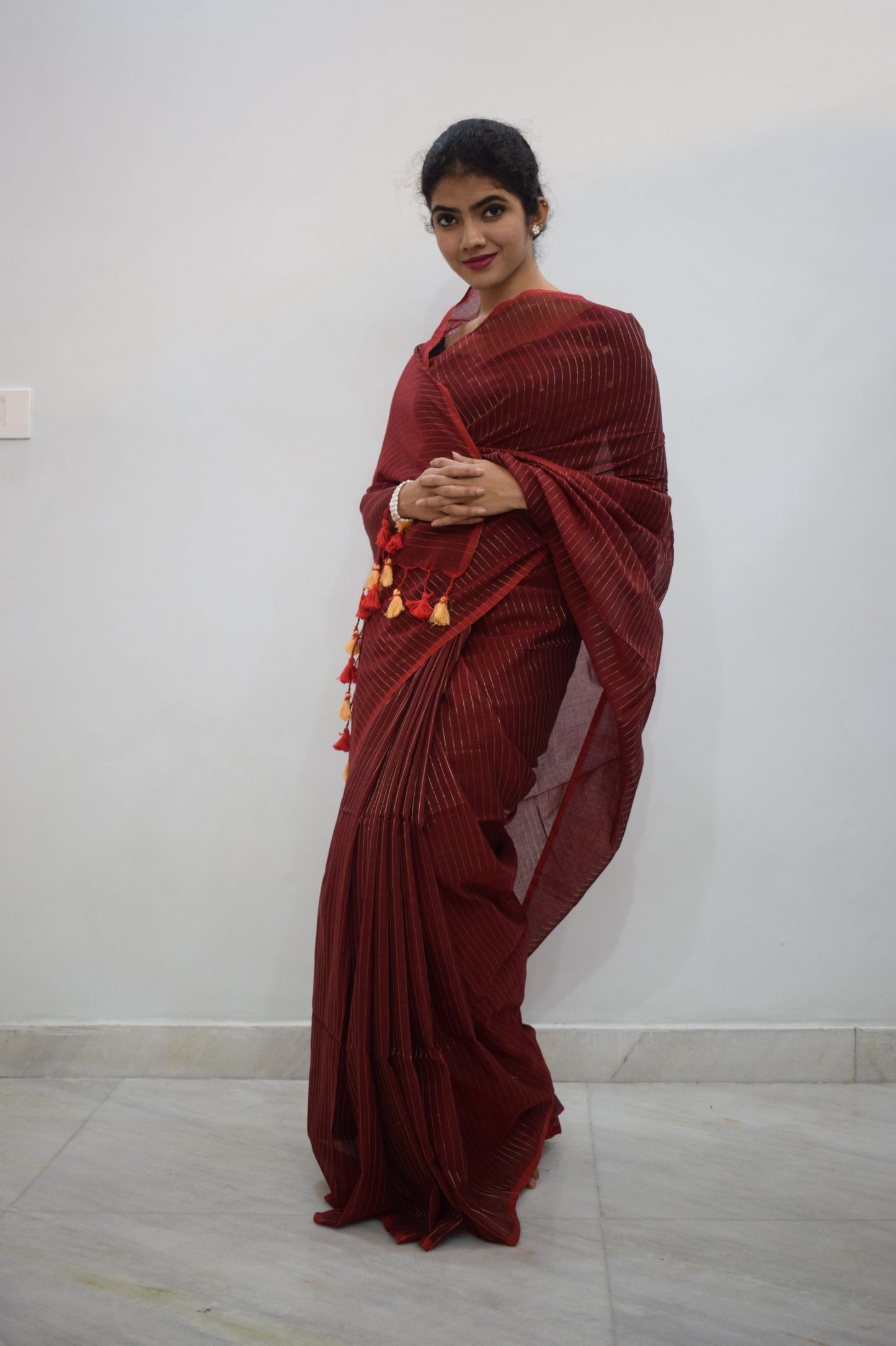 Nakshatra- Deep Red Mulmul-Zari Stripes Saree