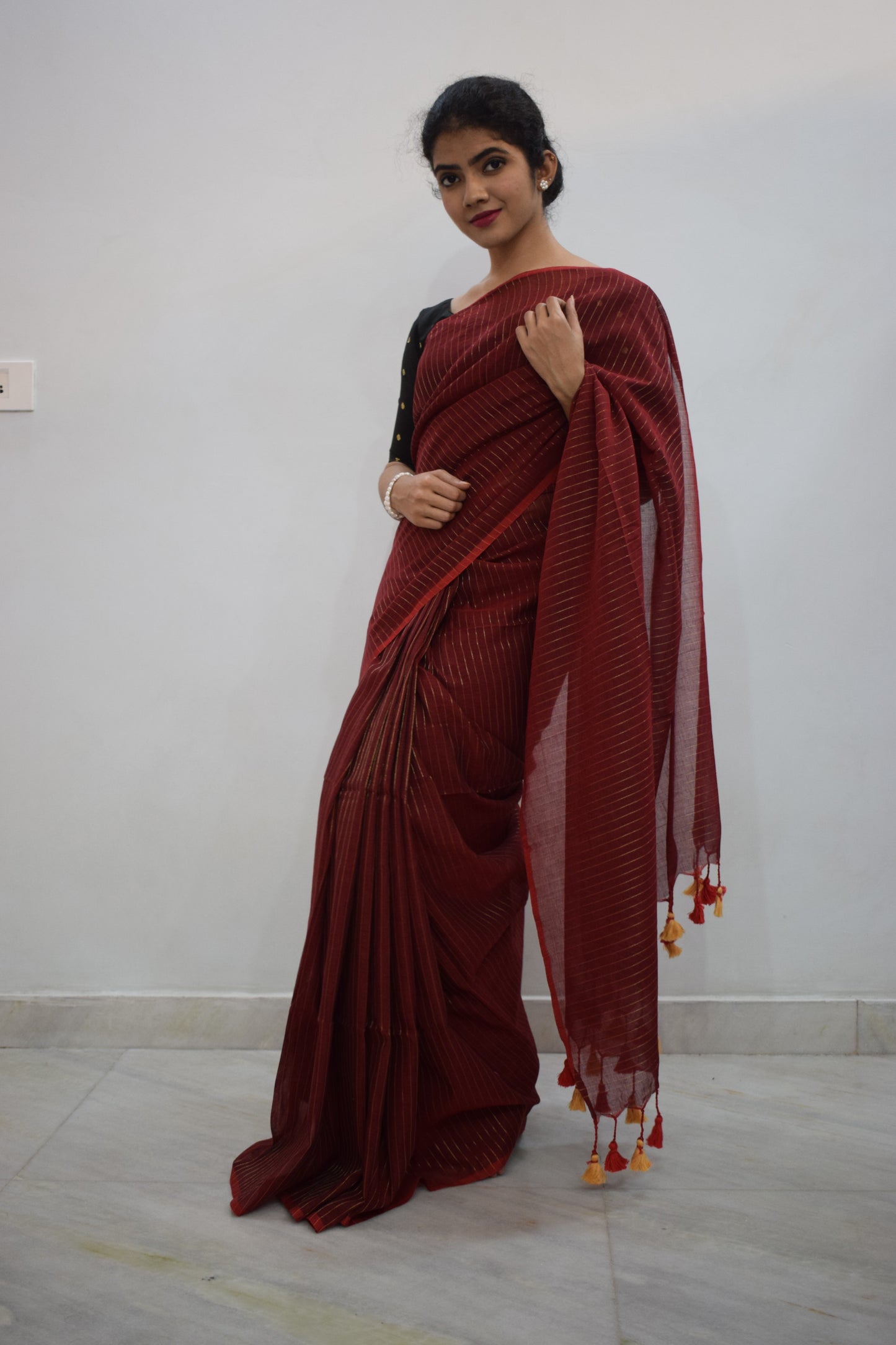 Nakshatra- Deep Red Mulmul-Zari Stripes Saree