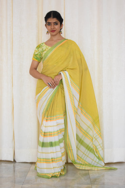 Namasya: Pale yellow, white & green Dhaniakhali saree